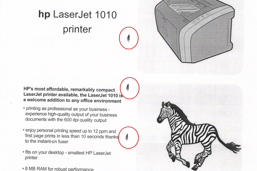 Принтер оставляет точки при печати (фото)